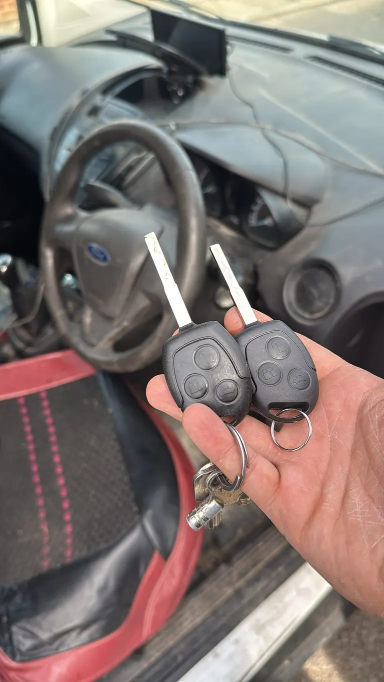 New and original Ford remote keys held inside a Ford Ka in Edgware after a spare key was cut and programmed at the car